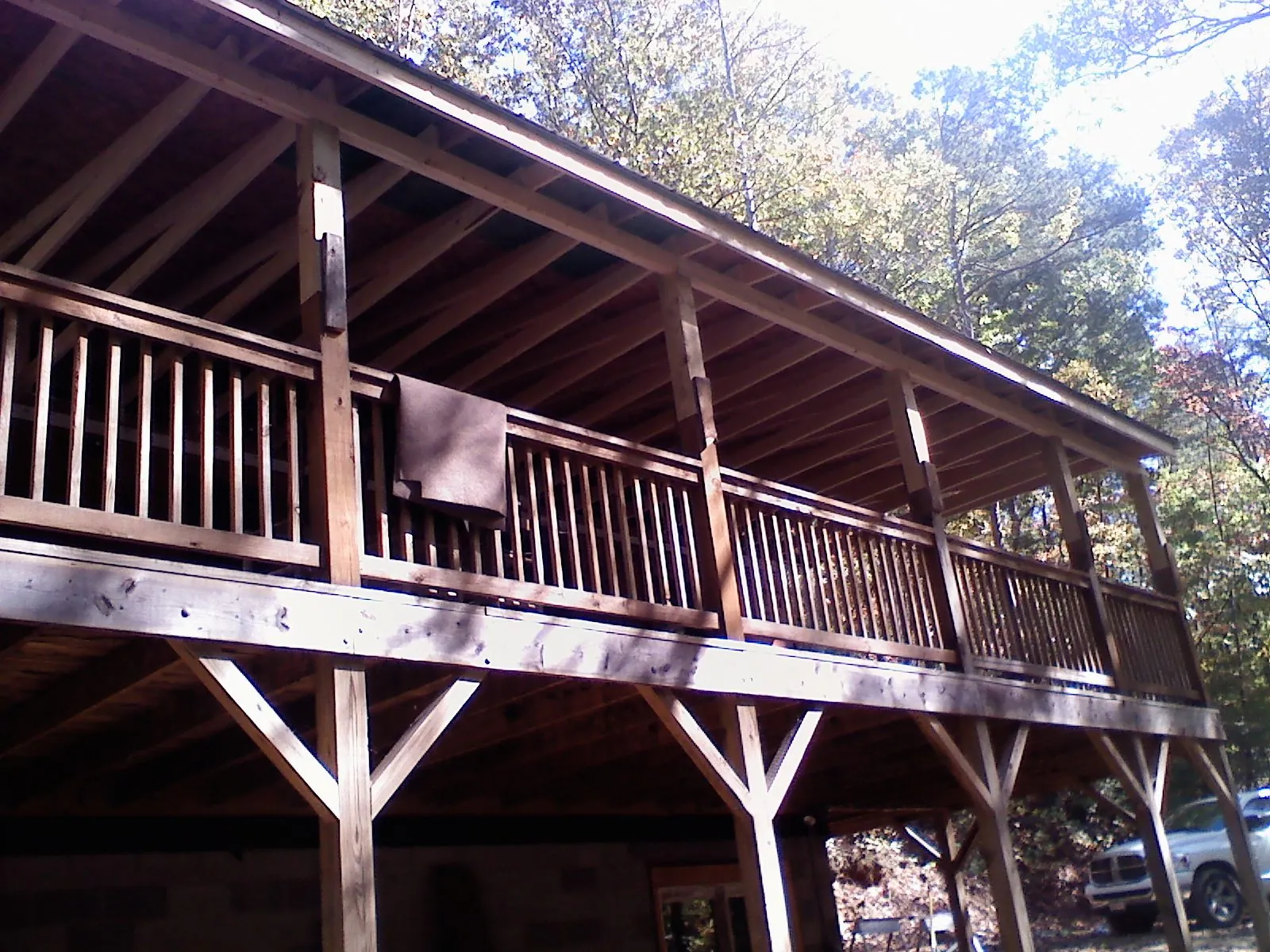 Timber framing under a new elevated porch and deck — Roof Leak Repair in Gilbertville by Roofing Brothers